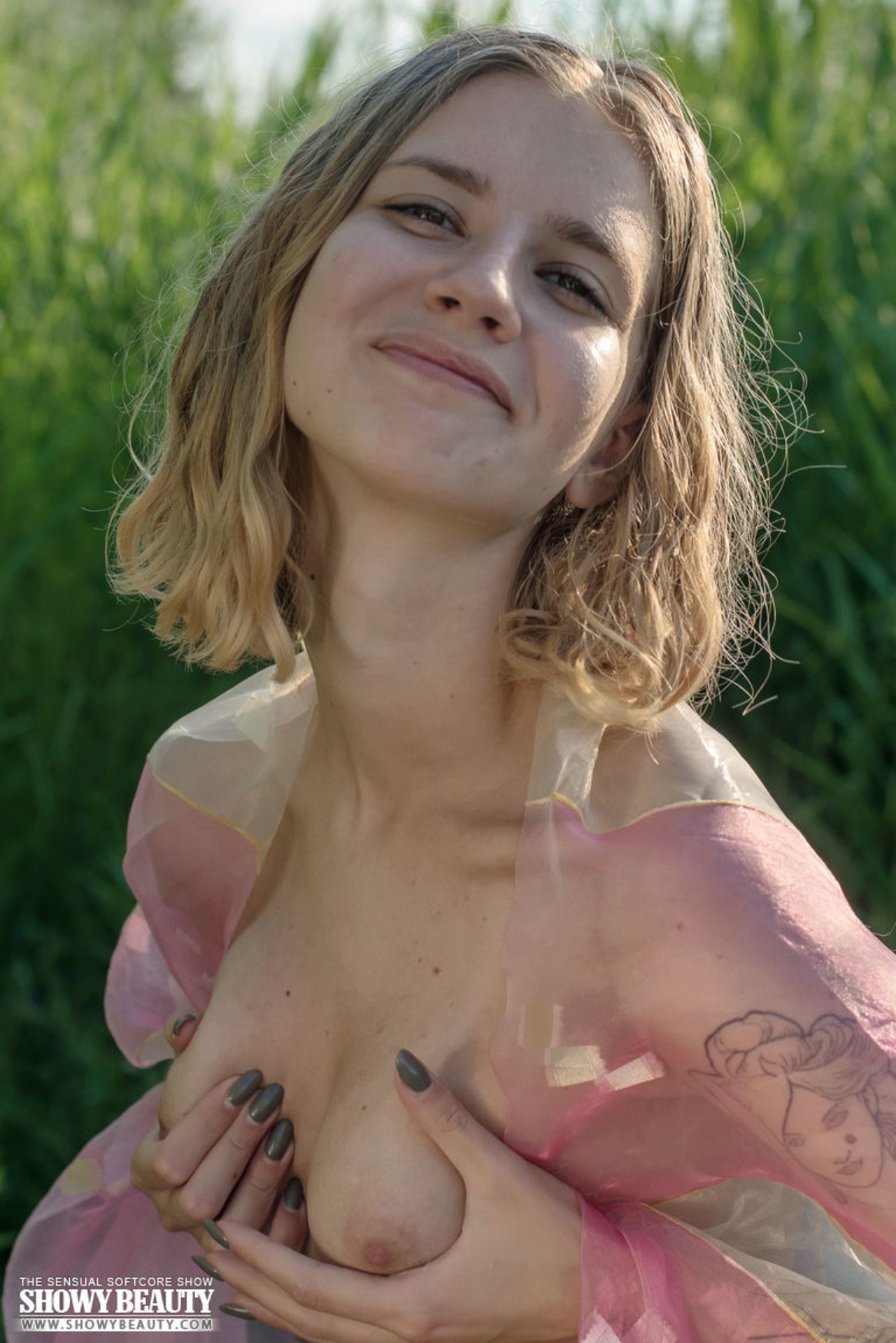 Posing naked by the reed-17