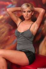 Hot Blonde Babe Gets Naked In Red Room-00